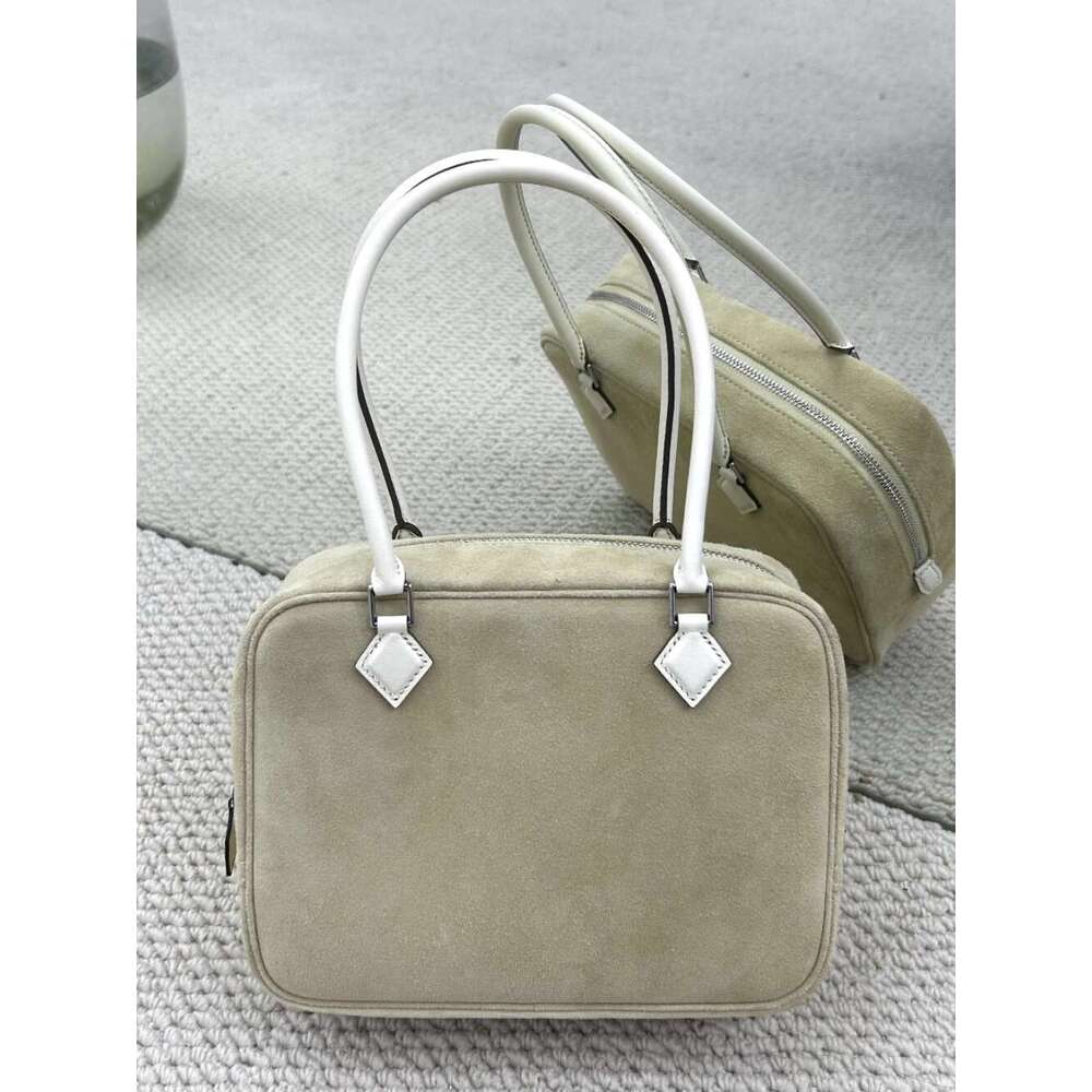 Steel hardware semi handmade Plume feather toe cover layer cowhide used box commuting hand held genuine leather women s bag