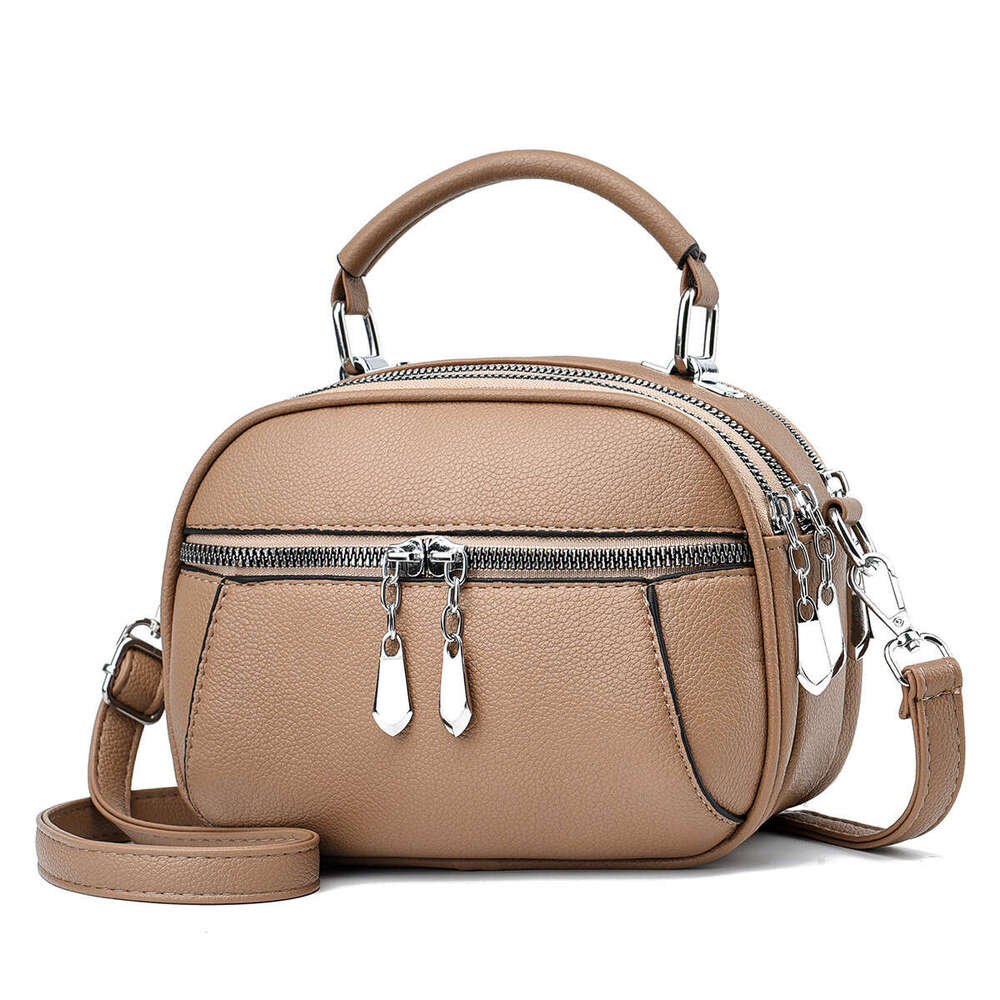 New handbag simple shoulder small round casual women s bag mother