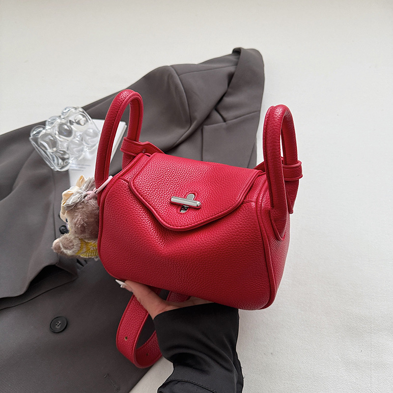 High end lychee patterned fashionable hand-held for women 2025 new trend versatile and stylish light luxury single shoulder crossbody bag