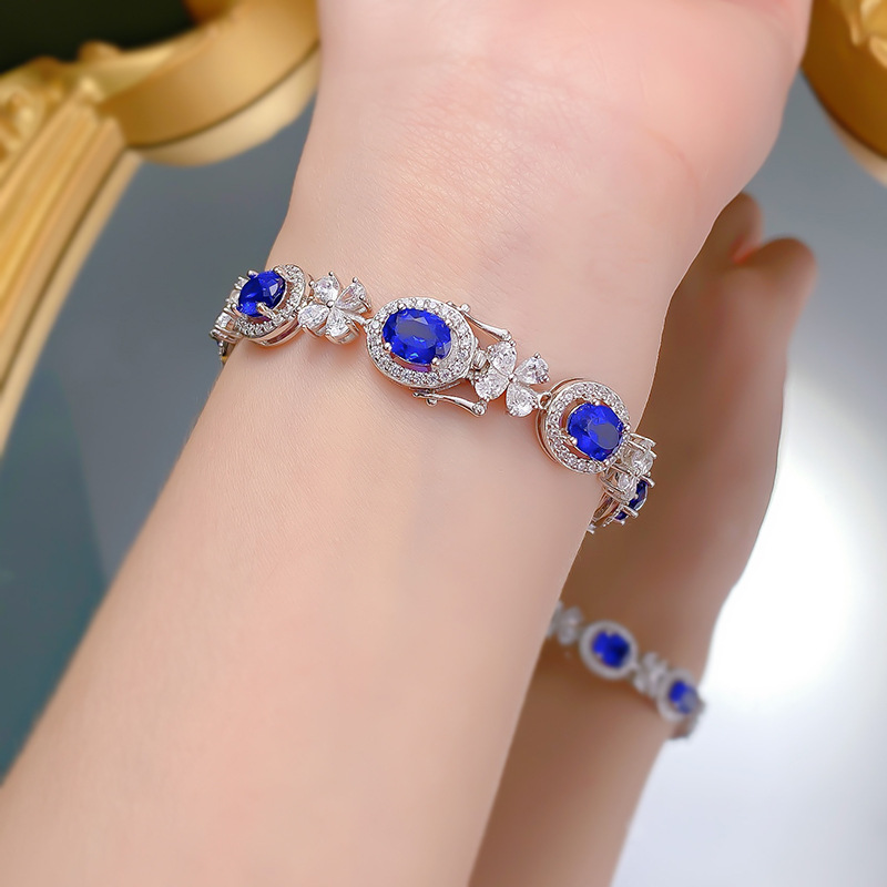 Sleek S925 Sterling Silver Bangle Adorned by Vibrant Oval Shape 6x8mm Royal Blue Sapphire Gemstone