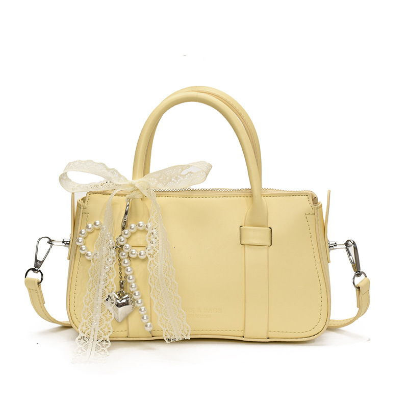 Korean version of fashionable hand-held pillow for women in summer 2025 simple and niche splicing style trendy crossbody bag