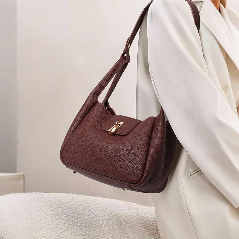 High Fashion First Swing 2025 New Leather Handbag Slung Bucket Portable Basket Bag