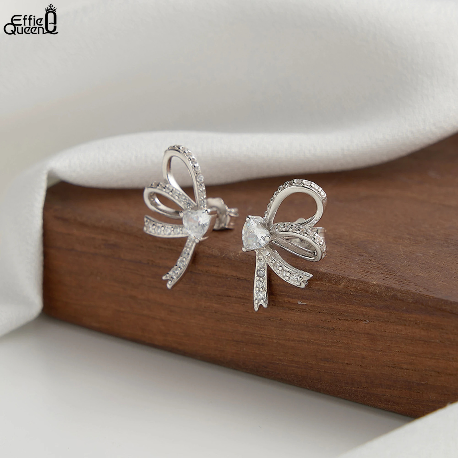 Effie Queen 925 Sterling Silver White Heart Zirconia Stud Earrings Bow Ear Accessory Romantic Gift for Her Wearing SE407 250517