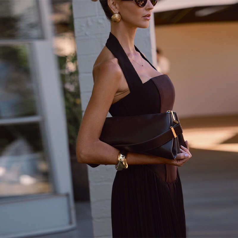 Hanging neck, strapless, pleated European American 2025 spring new socialite style waist cinched long skirt, chic and elegant clothing