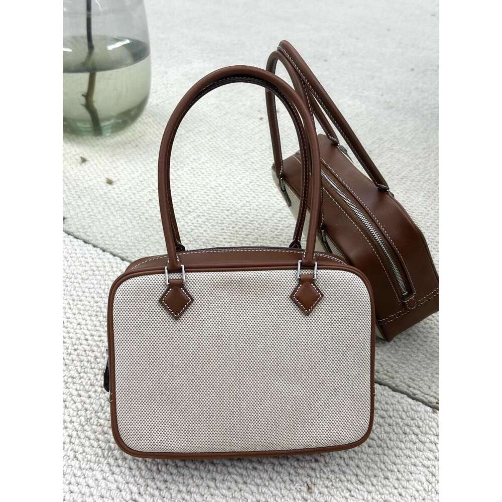 Steel hardware semi handmade Plume feather toe cover layer cowhide used box commuting hand held genuine leather women s bag