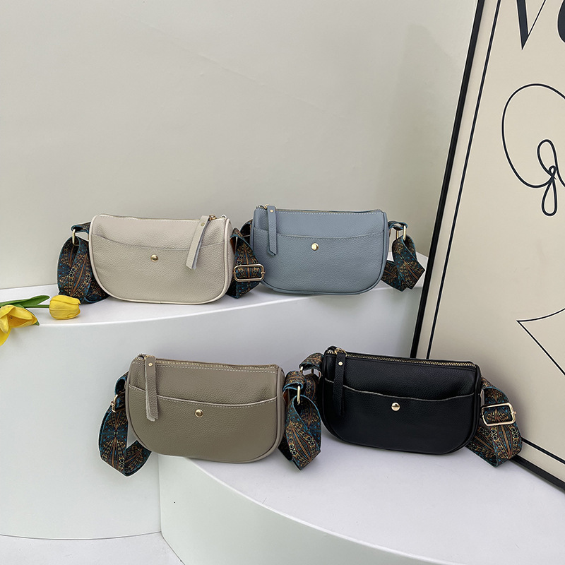 Genuine leather women's 2025 new style temperament top layer cowhide casual saddle fashionable wide shoulder strap crossbody bag