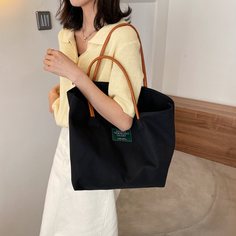 Free Delivery Designer Bag Spring New 2025 Stylish Casual Canvas Shoulder Ins Simple And Artistic Hand Held Trendy Tote Luxury Bag