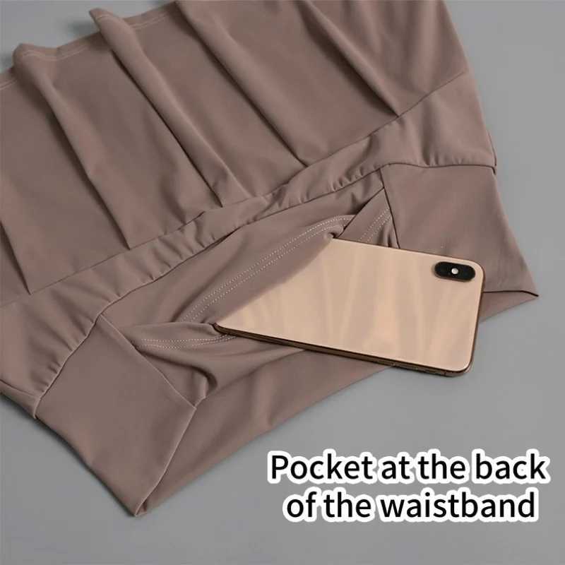 Womens Stretchy Slim-Fit Solid Color Sports Skirt With Pockets Perfect For Running Tennis And FitnessXJ250520