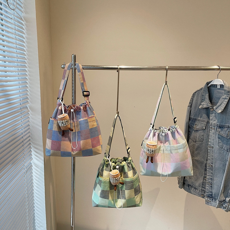 Fashionable large capacity underarm trendy spring new women's single shoulder crossbody bag striped grid fresh bucket casual dopamine knitted fab