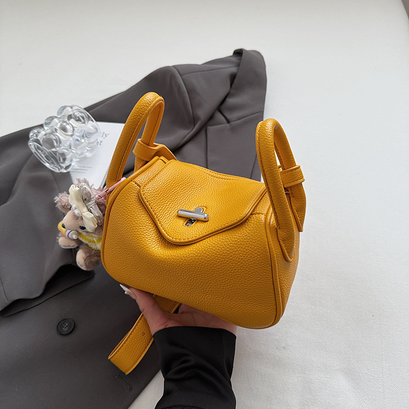 High end lychee patterned fashionable hand-held for women 2025 new trend versatile and stylish light luxury single shoulder crossbody bag