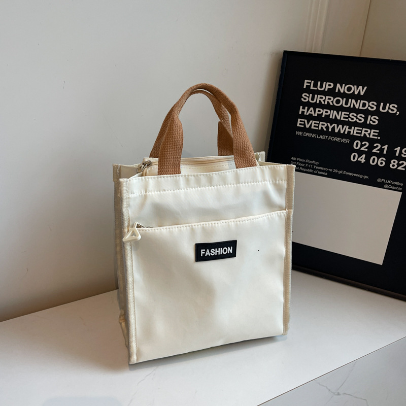 Free Delivery Designer Bag Korean Fashion Forest Series Large Capacity Handheld Tutorial 2025 Autumn Color Contrasting Waterproof Oxford Cloth Tote Ba