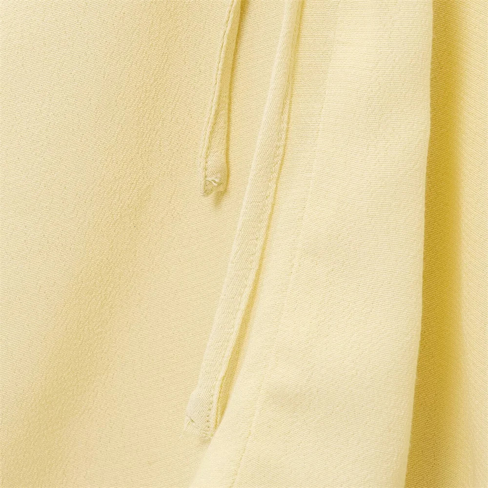 UNIZERA womens versatile solid color long sleeved shirt with ruffled edges and pleated temperament summer style 250520