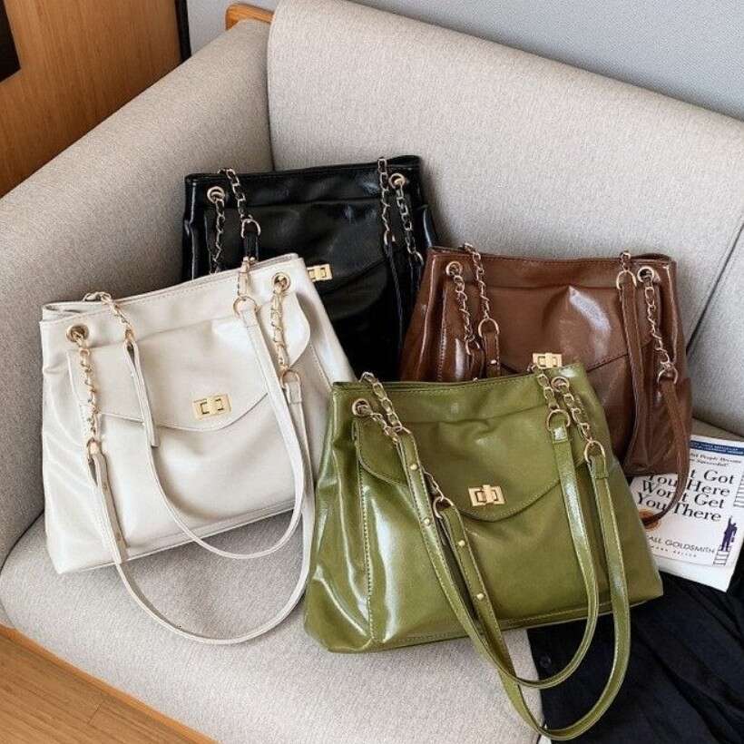 Design inspired Korean version single shoulder diagonal cross chain commuting large capacity wandering women's soft leather armpit bag 2025 tempe
