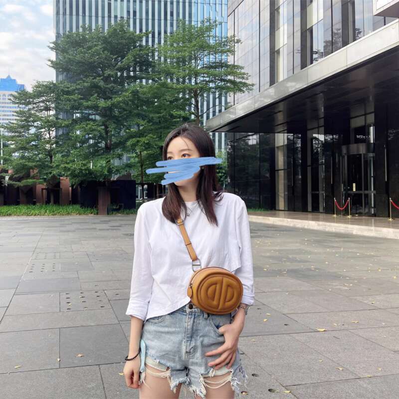 Swift cowhide nose new oval shaped mobile phone one shoulder crossbody chest bag genuine leather female pig