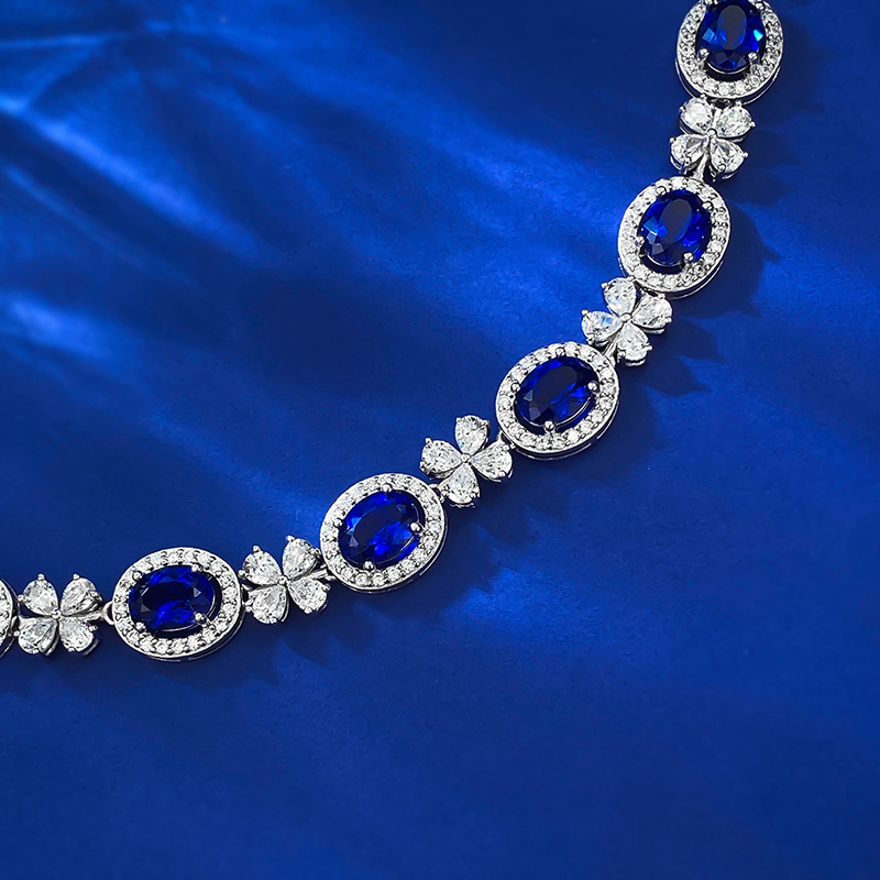 Sleek S925 Sterling Silver Bangle Adorned by Vibrant Oval Shape 6x8mm Royal Blue Sapphire Gemstone