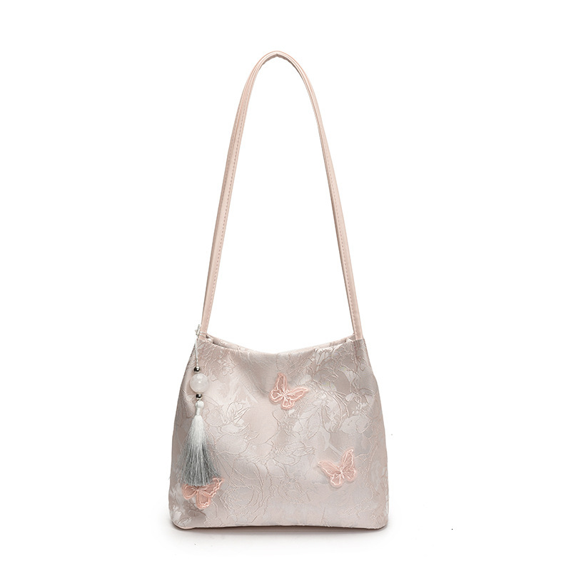 New Chinese style handbag for women in 2025, niche and popular butterfly embroidery shoulder bag, large capacity bucket bag