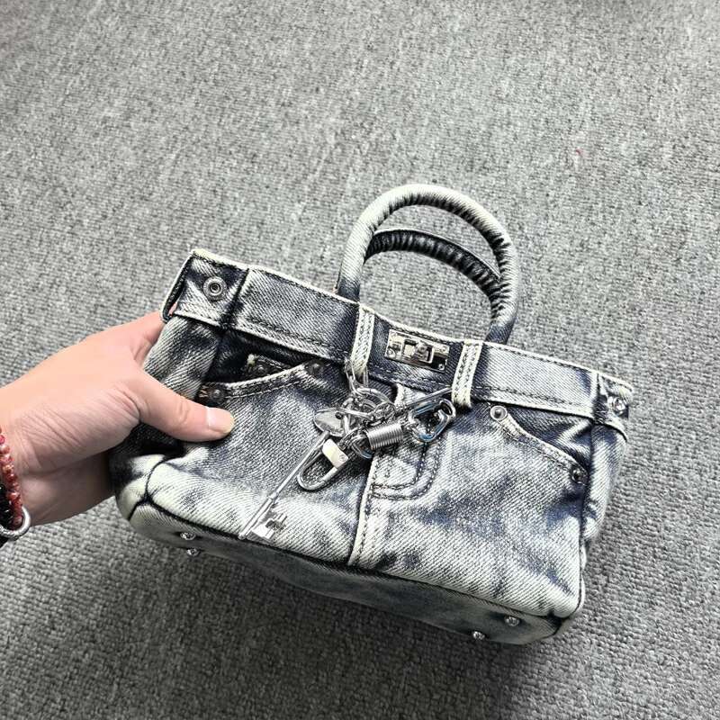 2025 new European and American classic lock design wash denim pants personalized top handle shoulder bag