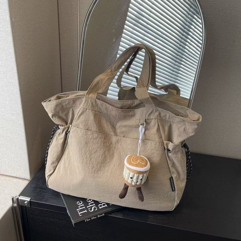 Casual canvas class commuting tote for women large capacity 2025 new spring/summer versatile this year's popular shoulder bag