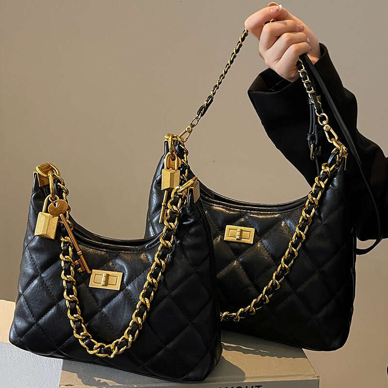 Xiaoxiangfeng Ling grid chain small women's 2025 new niche Black style shoulder crossbody wandering bag