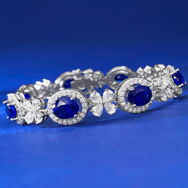 Sleek S925 Sterling Silver Bangle Adorned by Vibrant Oval Shape 6x8mm Royal Blue Sapphire Gemstone
