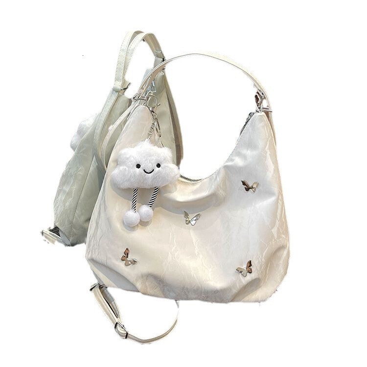 Women's large capacity butterfly decoration shoulder 2025 new fashionable commuting backpack multi-purpose tote bag