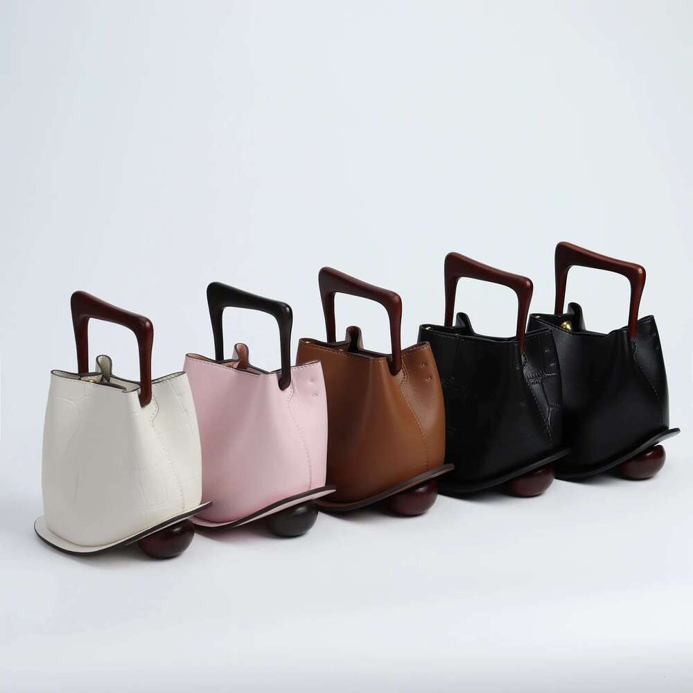 2025 Cowhide Leather Women's Brand Basket Bag Large Capacity Commuter Bucket Purses And Handbags