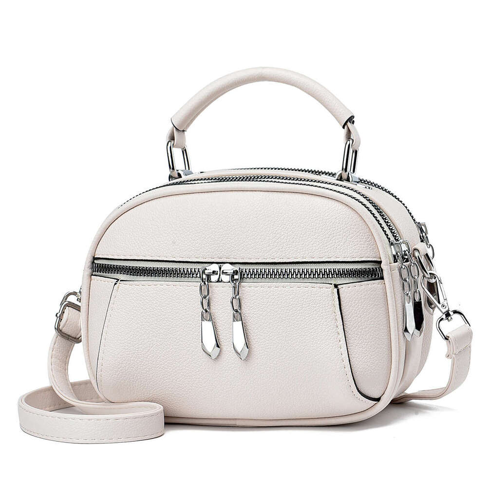 New handbag simple shoulder small round casual women s bag mother