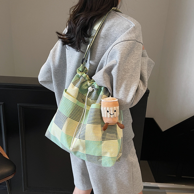 Fashionable large capacity underarm trendy spring new women's single shoulder crossbody bag striped grid fresh bucket casual dopamine knitted fab
