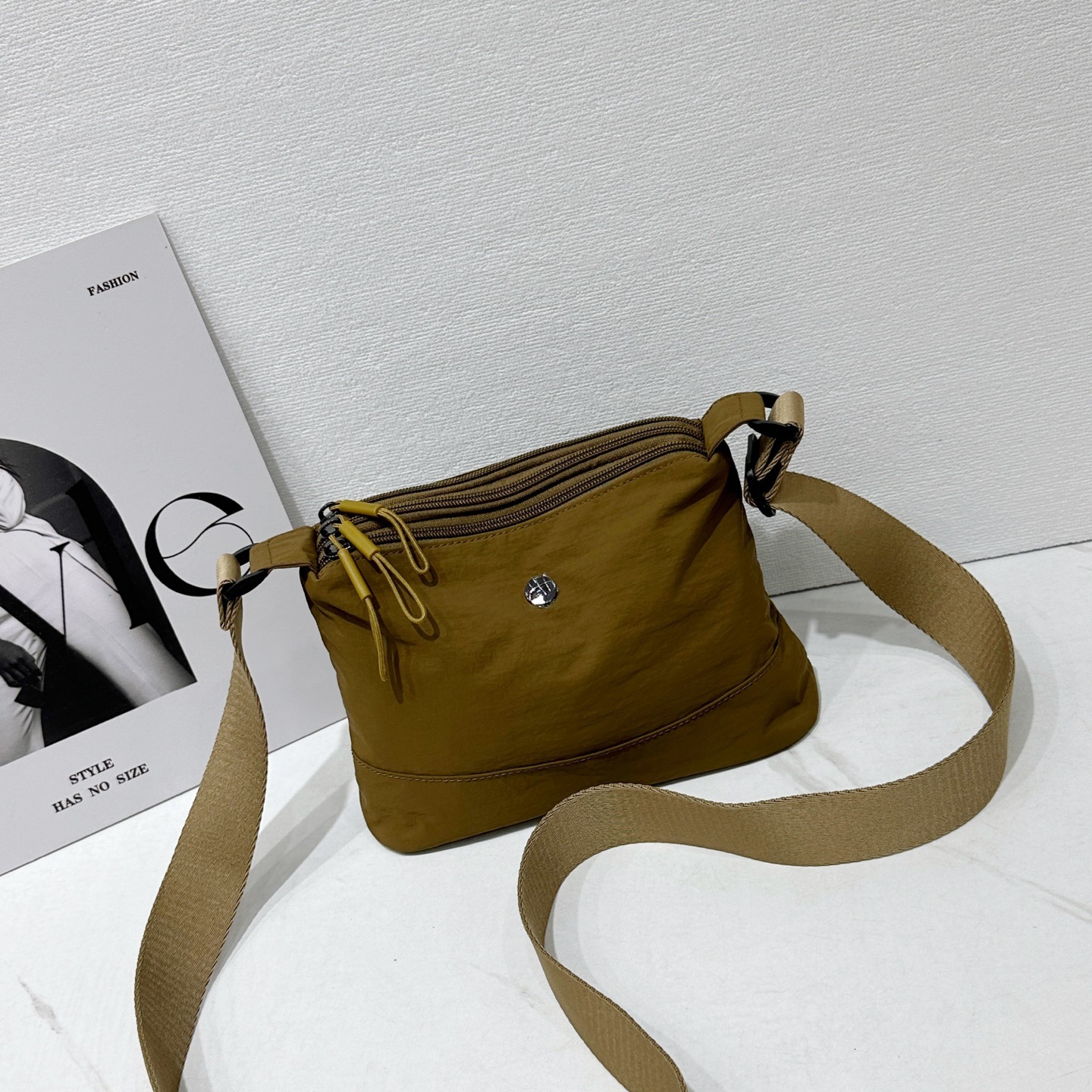 Casual versatile portable backpack new lightweight shoulder simple and fashionable niche crossbody bag stylish small square bag