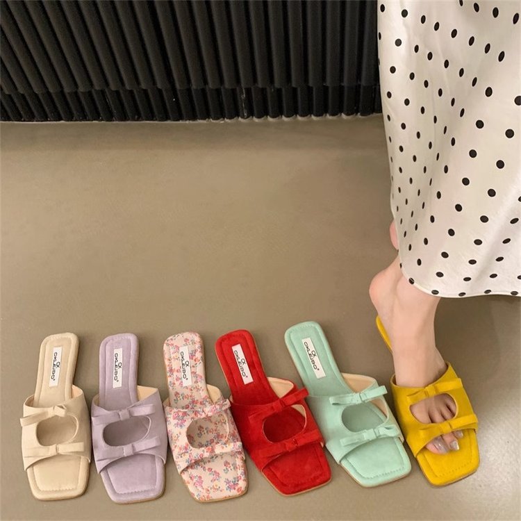 Free shipping Designer's super hot new summer 2025 flip-flops for women - French fashion bow flat outerwear vacation slippers