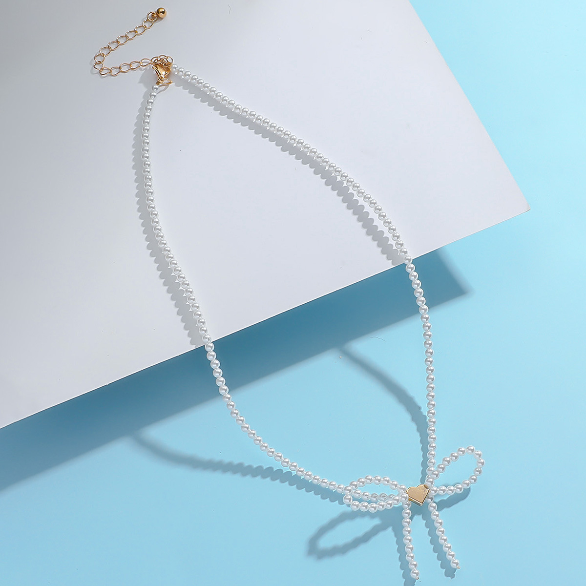 New bow pearl necklace, fashionable collarbone chain, high-end artistic niche set, bracelet accessories
