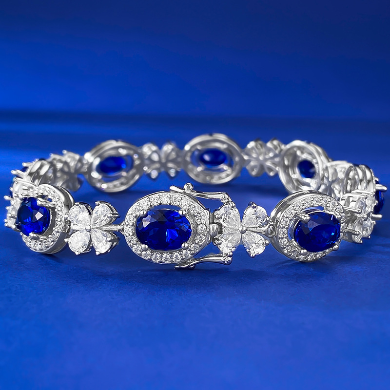 Sleek S925 Sterling Silver Bangle Adorned by Vibrant Oval Shape 6x8mm Royal Blue Sapphire Gemstone