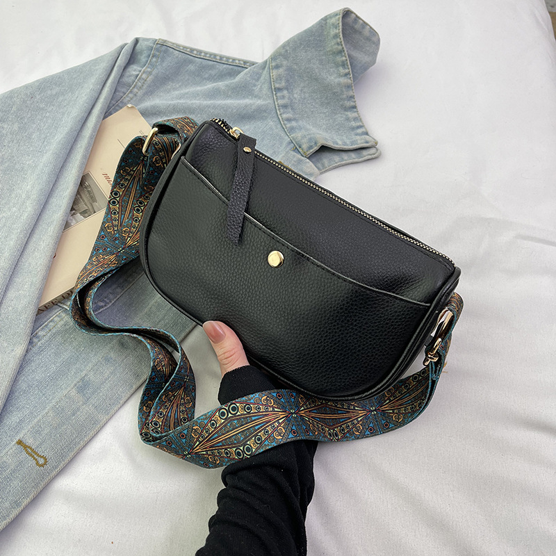 Genuine leather women's 2025 new style temperament top layer cowhide casual saddle fashionable wide shoulder strap crossbody bag