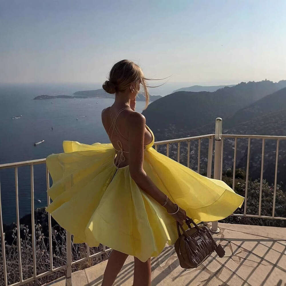 2025 summer solid color sleeveless V-neck backless strap short skirt sexy design sense European and American party dress women's new style temper