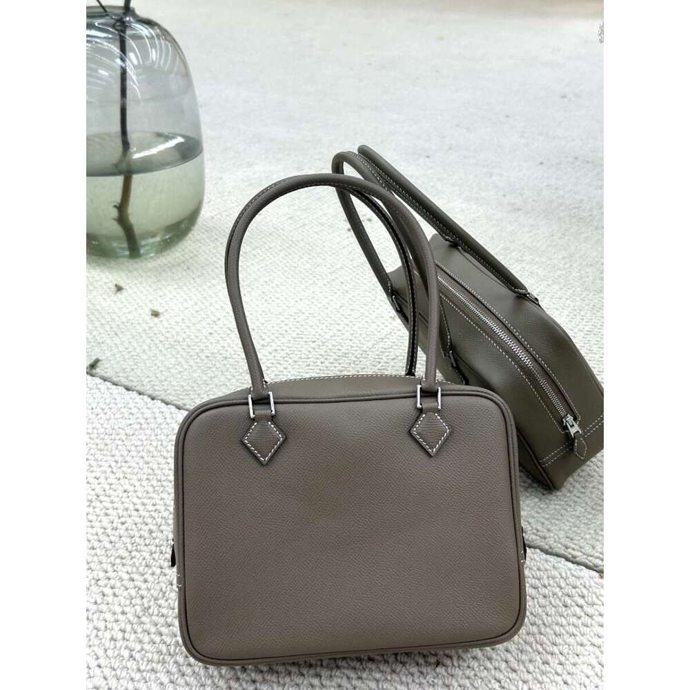 Steel hardware semi handmade Plume feather toe cover layer cowhide used box commuting hand held genuine leather women s bag