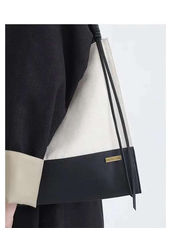 New Spliced Contrasting Color Bucket Shaped Canvas Light Fashionable And High-End Single Shoulder Women's Bag