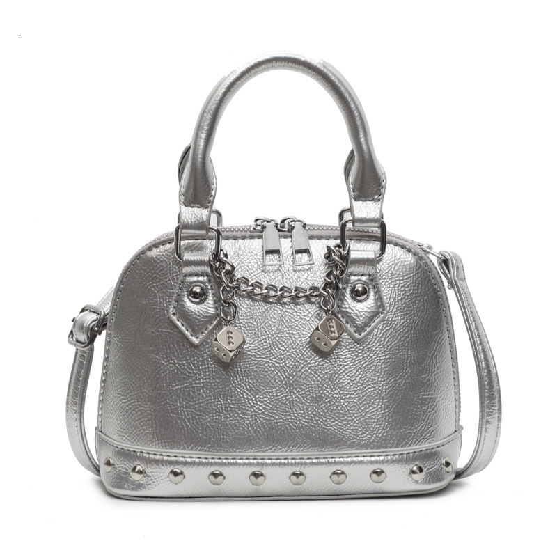 2025 new niche design high-end rivet hand-held shell versatile chain shoulder diagonal cross women's bag