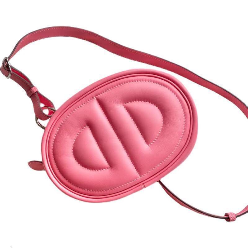 Swift cowhide nose new oval shaped mobile phone one shoulder crossbody chest bag genuine leather female pig