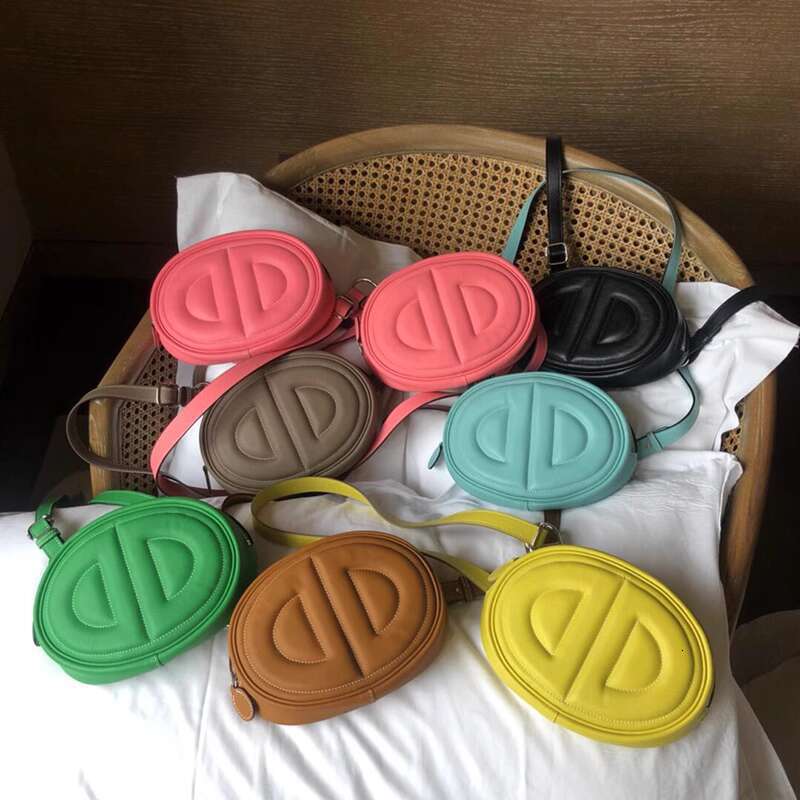 Swift cowhide nose new oval shaped mobile phone one shoulder crossbody chest bag genuine leather female pig