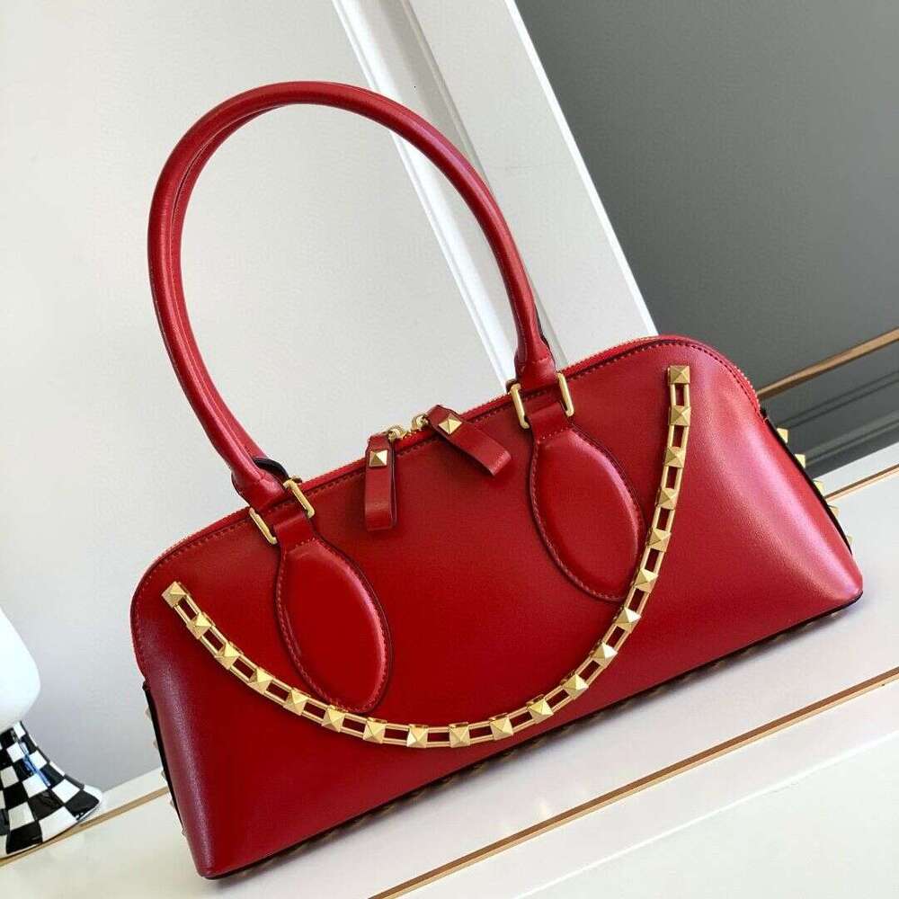 New Riveted Genuine Women s with High Grade Head Layer Leather Chain and Wind Carrying Bag