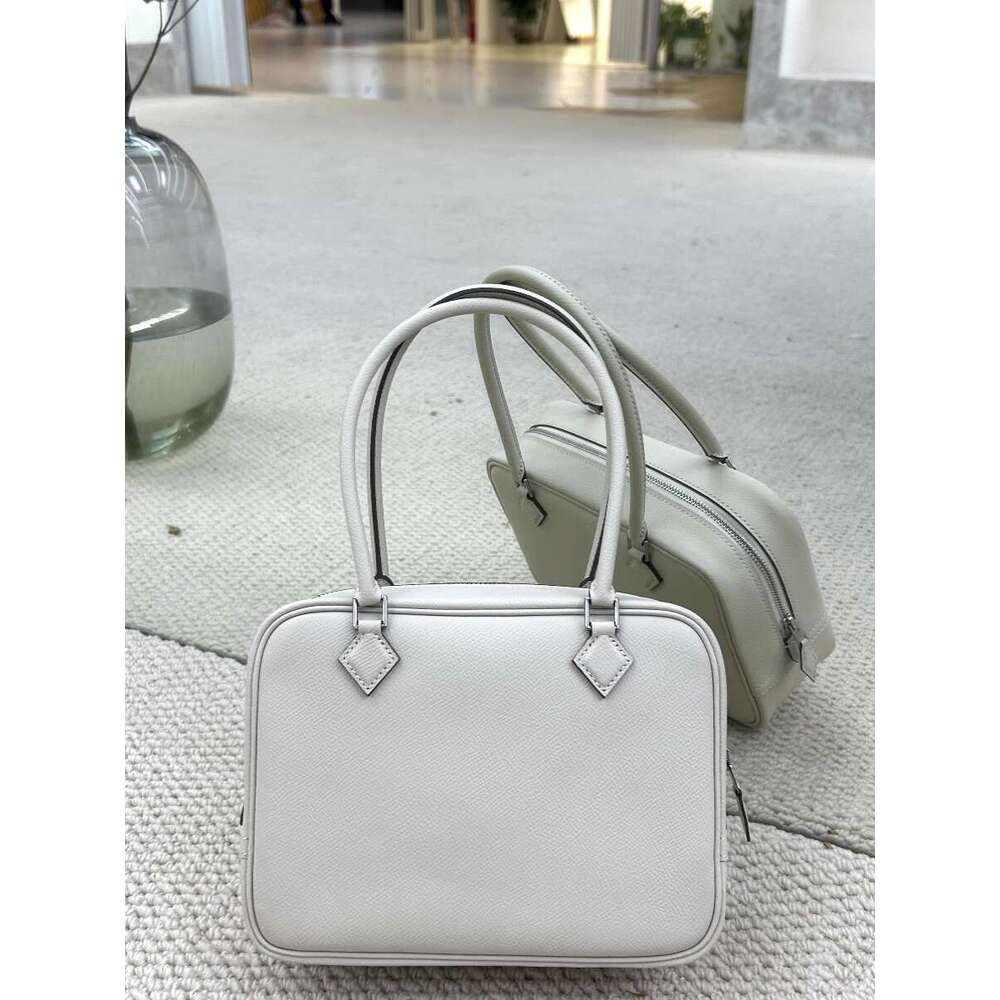 Steel hardware semi handmade Plume feather toe cover layer cowhide used box commuting hand held genuine leather women s bag