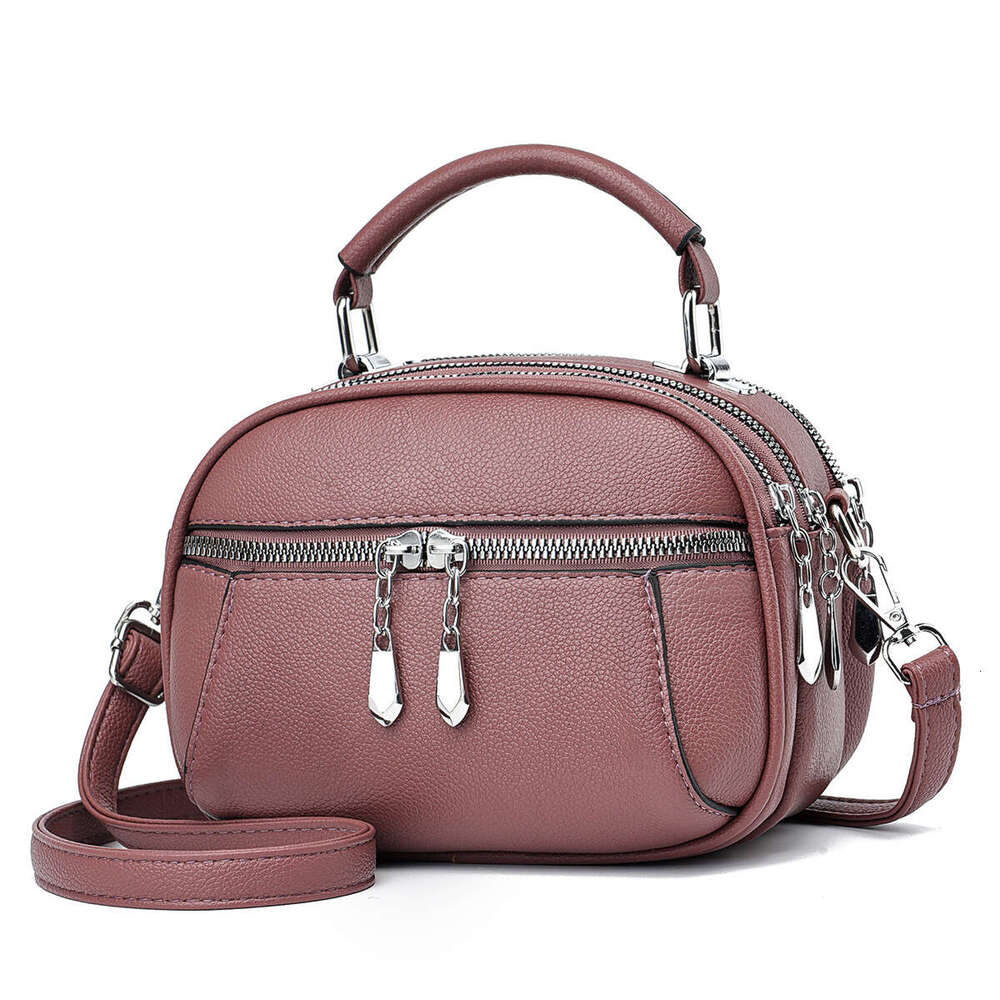 New handbag simple shoulder small round casual women s bag mother