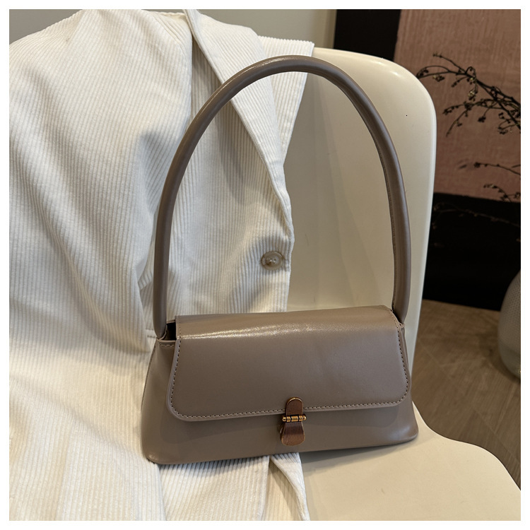 Niche Western style Underarm 2025 New Fashionable PU Handheld Versatile Ins Shoulder Women's Bag