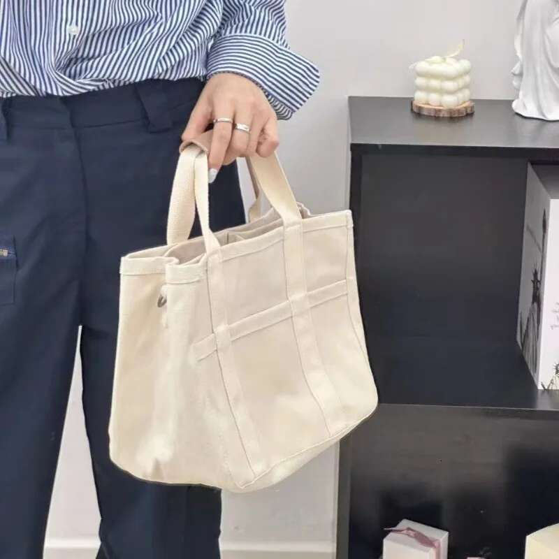 Fashionable multi-functional single-shoulder crossbody for and baby, hand-held canvas baby stroller, mother bag
