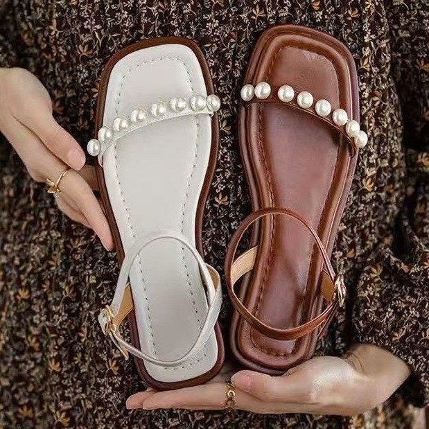 Free shipping Designer Women's Summer 2025 New one-strap Roman pearl sandals Fashionable and comfortable low-heeled open-toe flat beach shoes