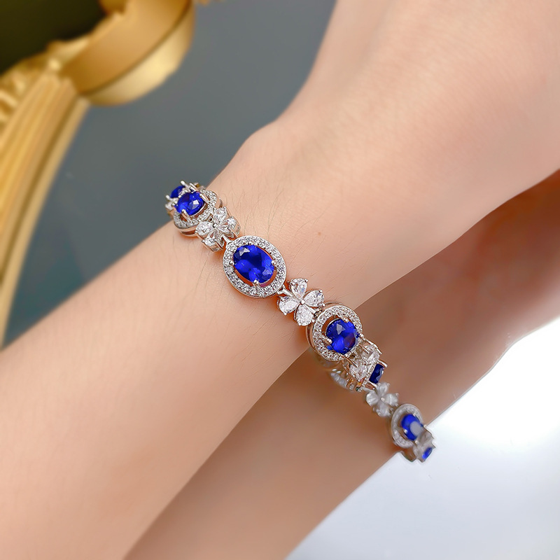 Sleek S925 Sterling Silver Bangle Adorned by Vibrant Oval Shape 6x8mm Royal Blue Sapphire Gemstone