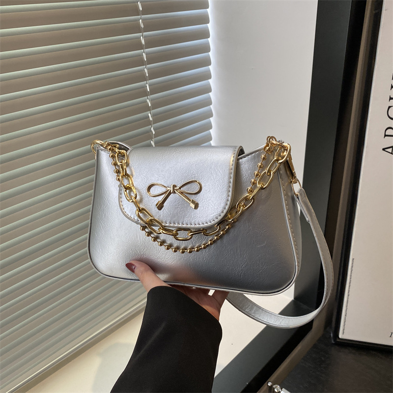 Free Delivery Designer Bag Korean Single Shoulder Chain Hand 2025 Spring New Simple And Versatile Commuting With Bow Decoration Crossbody Luxury