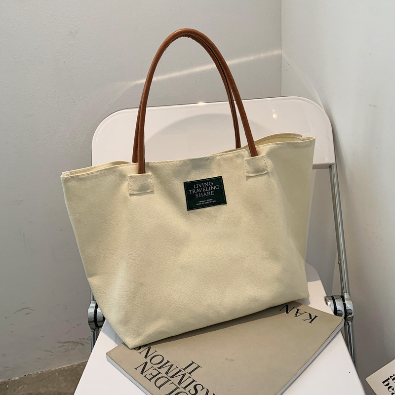 Free Delivery Designer Bag Spring New 2025 Stylish Casual Canvas Shoulder Ins Simple And Artistic Hand Held Trendy Tote Luxury Bag