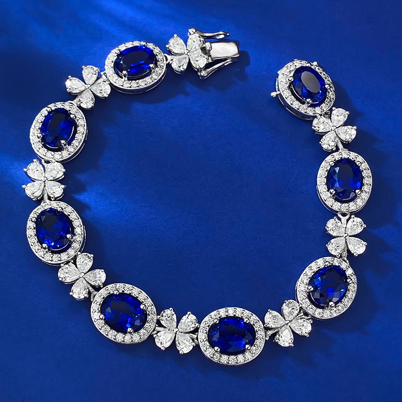 Sleek S925 Sterling Silver Bangle Adorned by Vibrant Oval Shape 6x8mm Royal Blue Sapphire Gemstone