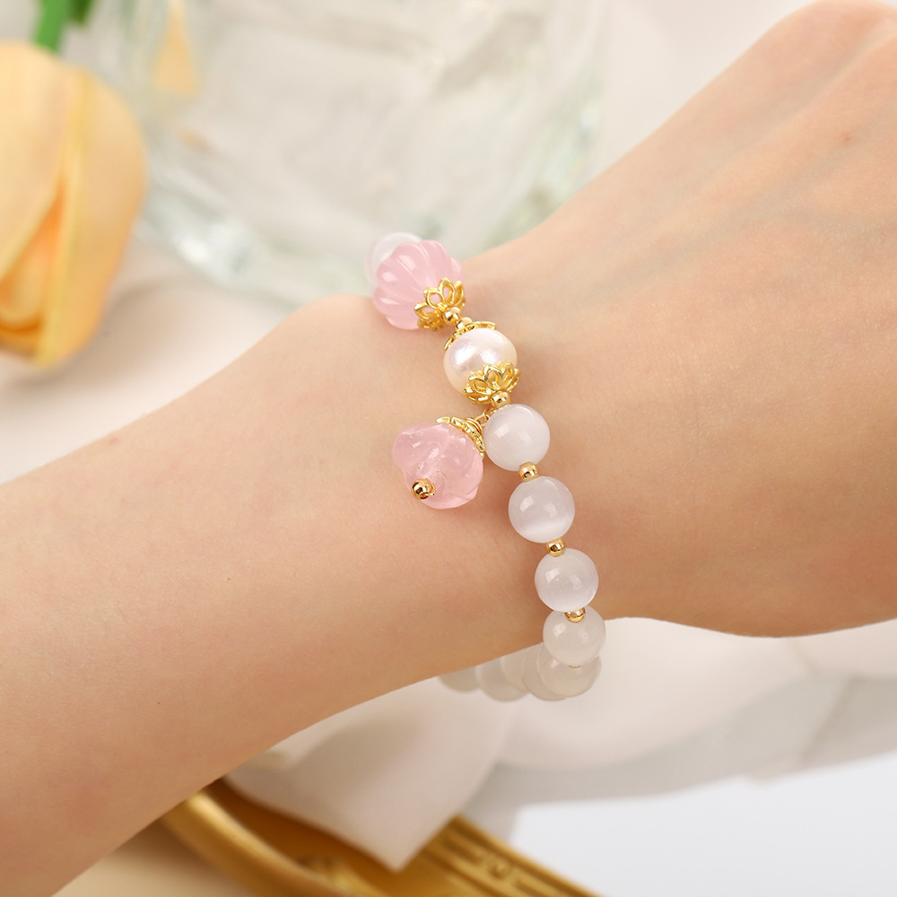 Chinese Ins Sakura Pink Pendant with a Unique Design, Crystal White Cat Eye Lotus Pong Women's Bracelet